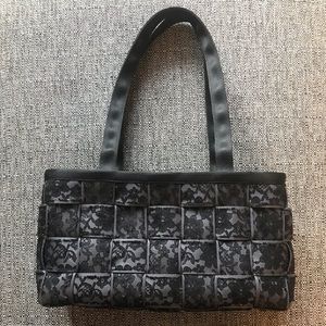 Harvey’s Seatbelt Bag Black Lace Tote Purse